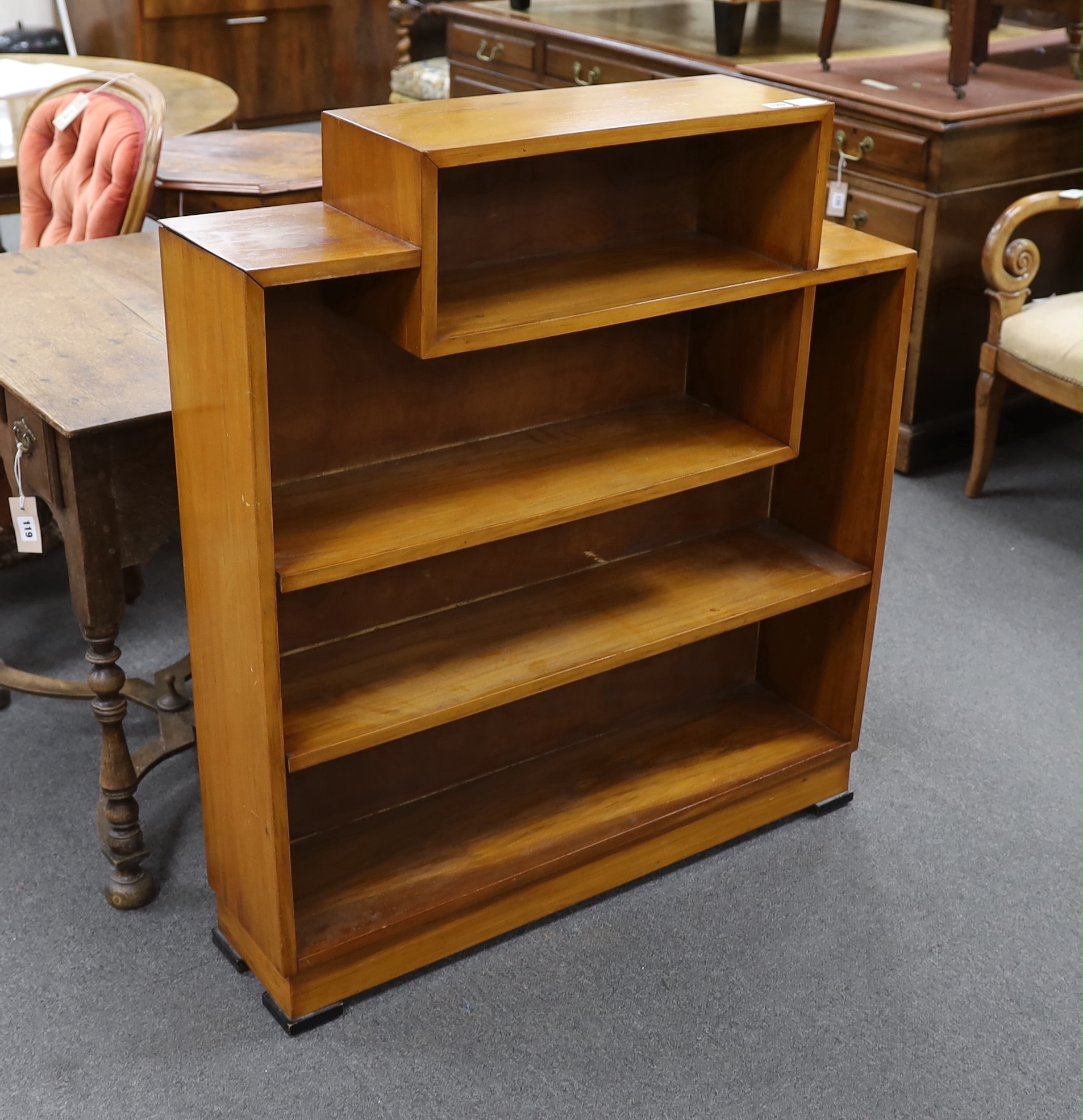 An Art Deco walnut open bookcase, width 91cm, depth 21cm, height 103cm